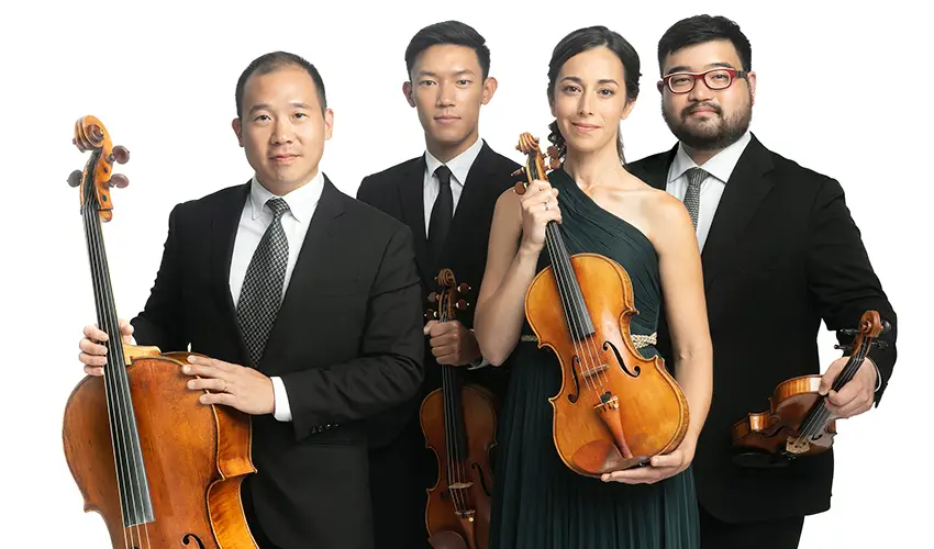 quartet and their instruments dressed in formal attire