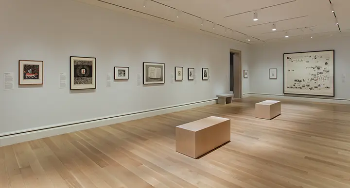photo of gallery interior showing works on paper