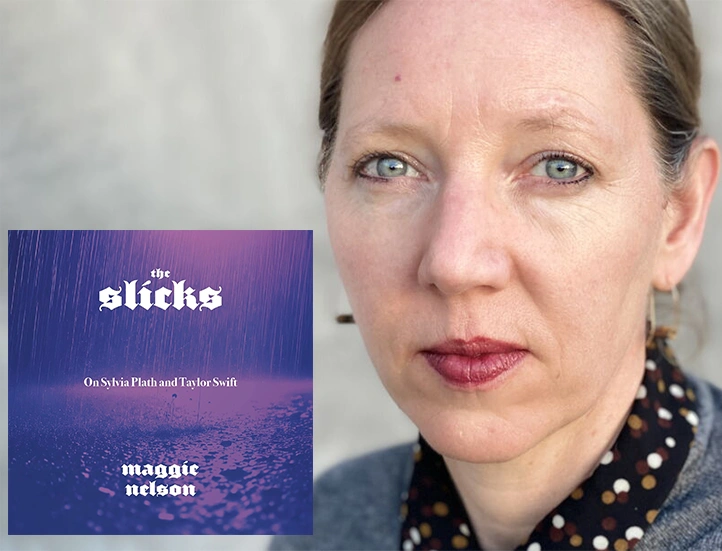 photo of woman with red lipstick and a grey sweater looking into lens