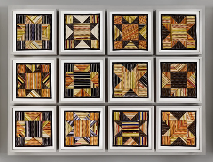 3 x 4 grid of square artworks of various geometrical cross patterns