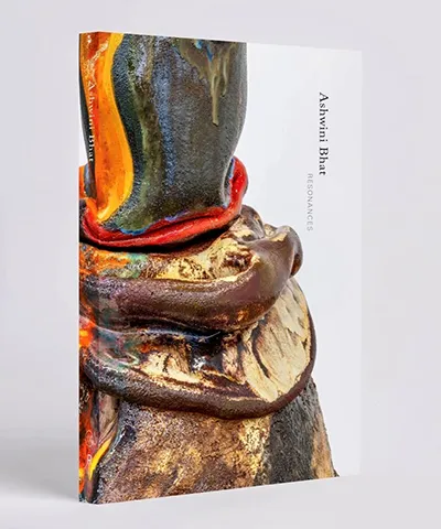 photo of a book entitled Resonances featuring an abstract detail of a sculpture on the cover