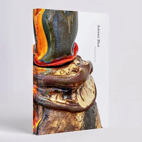 photo of a book entitled Resonances featuring an abstract detail of a sculpture on the cover