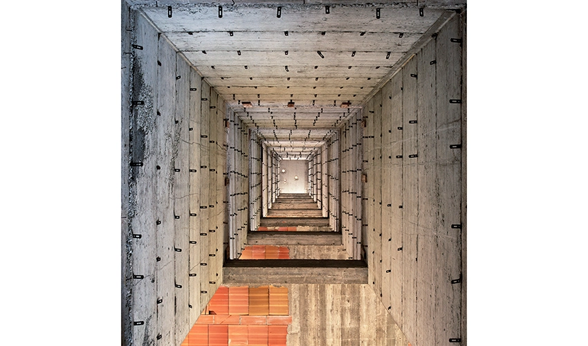 square photo of disorienting view of building interior