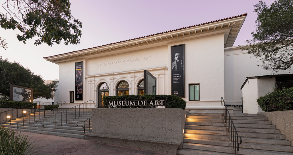 photo of the exterior of the front of the Museum at dusk