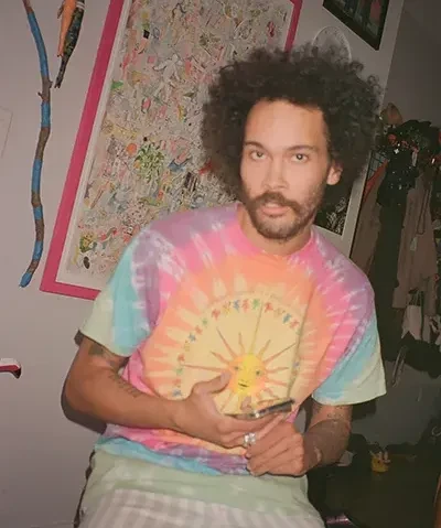 side by side composition of a photo of the artist with a beard and wearing a tie dyed shirt looking at the camera