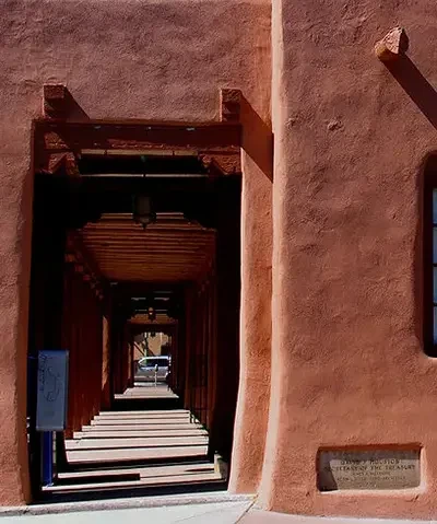 photo of exterior of adobe style building