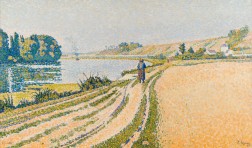 landscape view of pond and a wheat field with a figure walking on the road in between them