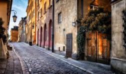 Autumn view of the birch street in the morning in Warsaw's Old Town, Poland iStock-1045577600